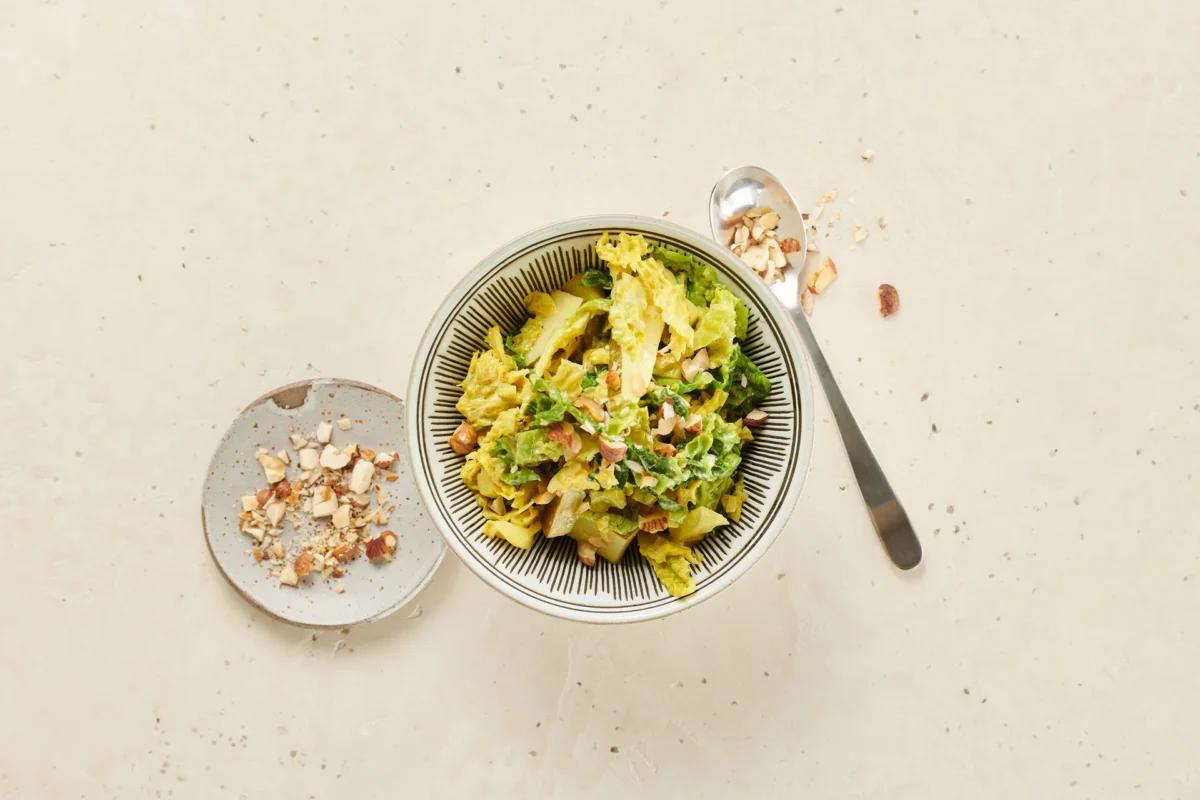 Wirz-Curry-Gemüse. Das fertige Gericht schön angerichtet und fotografiert aus Vogelperspektive (Food Fotografie). Serviervorschlag, Original Tiptopf Rezept, aus dem bekanntesten Kochbuch der Schweiz